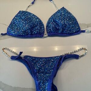 Toxic Angel, Womens NPC Stage Bikini. Color is Holo Indigo